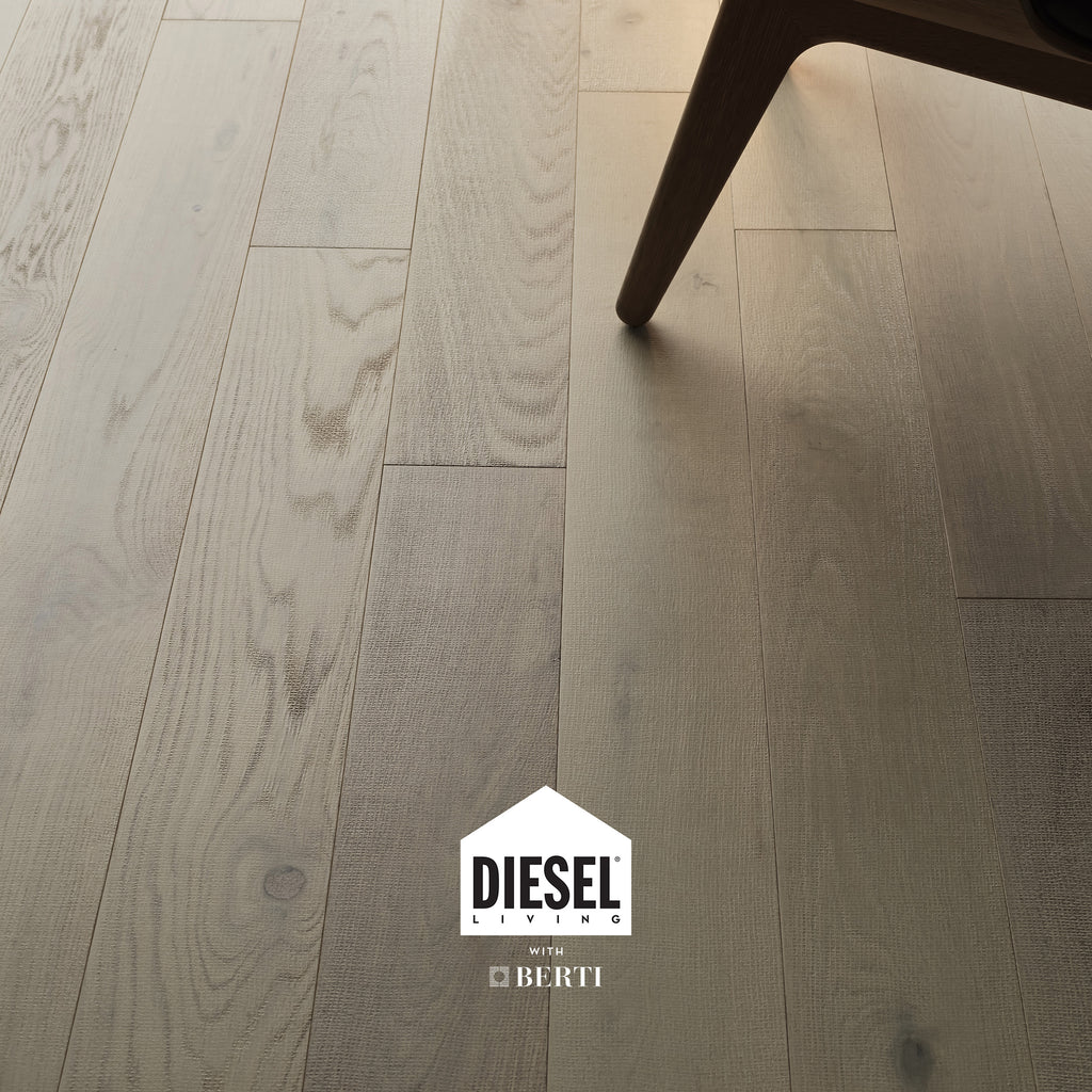 Light grey oak parquet flooring from Diesel Living with Berti, showcasing industrial style and refined texture.