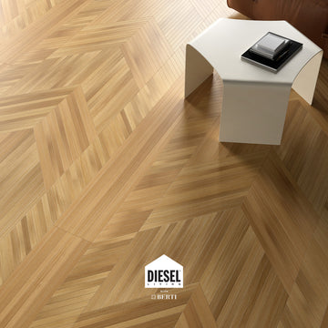 New Chevron flooring by Diesel Living with a modern white table, showcasing a unique timber design.
