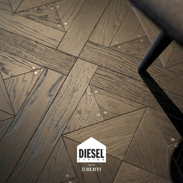 Stud Oak Dark Parquet flooring from Diesel Living and Berti, showcasing rich dark brown tones and stunning wood grain detail.
